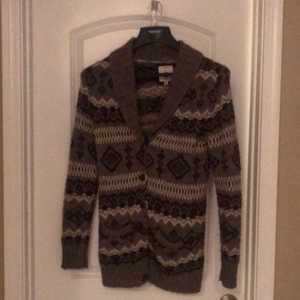 Long cozy print sweater; button up, 70% acrylic-30% wool. Super cute and warm!